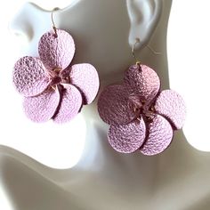 These small 2x2" handmade leather flowers are the perfect gift for a special person in your life. A gift that is as unique and beautiful as she. **Now both are with gold plated nickel free ear wires.** These earrings are crafted with high-quality, lightweight leather available in gorgeous metallic pink and shimmery green. You can also message me for custom colors (orange, red, black, etc.) or a bouquet of earrings. Whether you are heading to a business meeting, a ladies' night, or a date night, Handmade Adjustable Flower Earrings For Gift, Party Flower Earrings, Nickel-free Flower-shaped Party Earrings, Leather Flower, Colors Orange, Earrings Christmas, Christmas Gift For Her, Leather Flowers, Metallic Pink