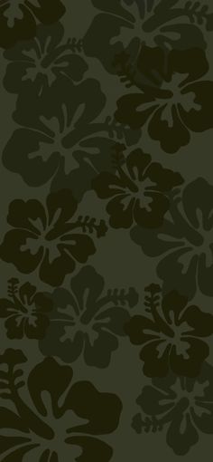 a black and green flower pattern on a dark background