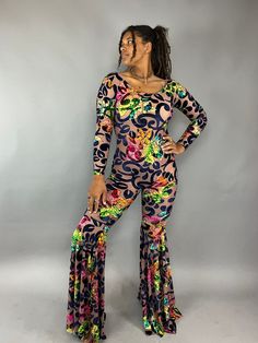 About this item Step into the comfort and glam with our stunning floral print Disco Jumpsuit!This Custom Bell Bottom Catsuit is the perfect choice for your next elegant party or festival outing. Each piece is meticulously crafted to measure, ensuring a flawless fit that's tailored just for you.Featuring luxurious crush velvet slightly see trough , this Glamorous Catsuit exudes royalty and sophistication.The bell bottom pants and long sleeves with a boat neck a captivating silhouette that's bound Disco Jumpsuit, Catsuit Costume, Bohemian Pants, Exotic Dance, Coachella Outfit, Bell Bottom Pants, Elegant Party, Bell Bottom, Crushed Velvet