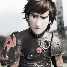 an animated character in armor with red accents on his chest and shoulder, looking at the camera