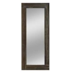 a large mirror sitting on top of a wooden frame