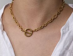 Who doesn’t love versatile? Wear this piece with the clasp in the front or back depending on your style! This stylish necklace is perfect for a simple look to wear alone or stacked with a few of our other HOJM necklaces. The quality and simplicity of it make for a necklace you never want to take off. Material: Gold Plated over Stainless Steel Base. Tarnish Free and Water Resistant Length: 16inch Allergies: Hypoallergenic Chic Toggle Necklace With Paperclip Chain For Everyday, Chic Everyday Toggle Necklace With Paperclip Chain, Classic Toggle Necklace For Everyday, Metal Chain Necklace For Everyday Use, Everyday Link Necklaces With Lobster Clasp, Everyday Adjustable Chain Necklace, Chic Toggle Necklace With Adjustable Chain For Everyday, Everyday Metal Lariat Necklaces, Chic Everyday Necklaces With Toggle Clasp