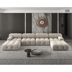 a living room with a large sectional couch and coffee table