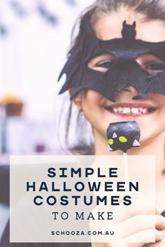 a woman wearing a bat mask holding a toothpick with the words simple halloween costumes to make