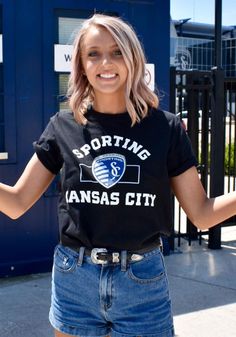 Sporting Kansas City Black Building Strategy Short Sleeve T Shirt - 17257268 Fandom T-shirt With Text Print, Black T-shirt With Football Season Text Print, Black T-shirt With Text Print For Football Season, Black Crew Neck T-shirt For School Spirit, Black Sports Fan Top With Screen Print, Black Fandom T-shirt With Letter Print, Black T-shirt With Team Logo, School Spirit Style, Black Fandom Tops For Fan Merchandise, Black T-shirt With Team Logo For School Spirit