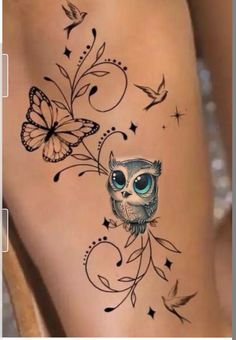 an owl and butterfly tattoo on the leg