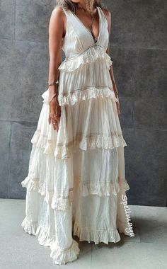 Handmade ruffled raw cotton dress with lining. Was $139 now on sale $105 Decorate with lace. Deep v neck, elastic at the back. 2 colors cream and white, Measurements: Bust 32 up to 38 inches. Hip Free Length 56.5 inches. CARE: Machine wash cold. Sleeveless Ruffled Dress For Beach Wedding, White Maxi Dress With Ruffled Skirt, Flowy Ruffle Dress For Beach Wedding, Elegant Beige Tiered Maxi Dress, Bohemian Tiered Wedding Maxi Dress, Bohemian Tiered Maxi Dress For Wedding, Bohemian Tiered Cream Maxi Dress, Bohemian Cream Tiered Maxi Dress, Floor-length Ruffled Maxi Dress For Wedding