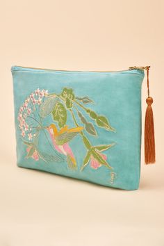 This Hummingbird Zip Pouch is feminine and bold in equal measure. Featuring fabulous florals, rich aqua tones, and everyone’s favorite hummingbird character to create the most gorgeous zip pouch this season. This velvet zip pouch will have you feeling glamorous day-to-night. Carry down to evening drinks or keep in your hand luggage as an organizer. Comes with complimentary gift packaging - this will make a perfect gift for someone special! Purse Ideas, Mini Pouch, Super Gifts, Mini Pouches, Gold Embroidery, Zip Pouch, Special Birthday, Beautiful Embroidery, Hummingbirds