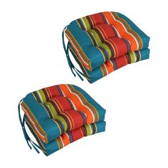 set of four multicolored outdoor cushions with tassels