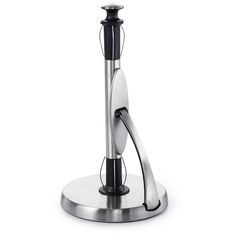 a silver and black candle holder on a white background with no one around it or someone else