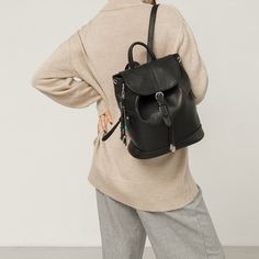 This backpack will perfectly complement almost any set. In the frantic pace of the big city, this ability makes it an indispensable thing: whatever you wear in the morning, it will fit into the look, and you won't have to spend time choosing the right handbag.The functionality of this backpack can compete with the most seemingly practical models. It is tightened on a strong string and closed with a valve, with a reliable metal clasp. Zippered pockets on the sides - for quick access to the necess Leather Anti-theft Backpack For Everyday, Versatile Daily Use Leather Backpack With Anti-theft Features, Everyday Leather Anti-theft Shoulder Bag, Casual Anti-theft Leather Backpack For Everyday, Casual Anti-theft Leather Backpack, Versatile Leather Backpack With Anti-theft Features, Casual Leather Backpack For Commuting, Versatile Anti-theft Leather Backpack, Versatile Leather Anti-theft Backpack