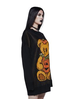 I was haunted to meet you. This oversized sweater has long sleeves, a crew neckline, and a lil bear in a jack-o-lantern intarsia pattern. Spooky Long Sleeve Black Sweater, Spooky Black Long Sleeve Sweater, Intarsia Patterns, Costume Store, Oversized Sweater, Dolls Kill, Jack O Lantern, Exclusive Collection, Black Sweaters