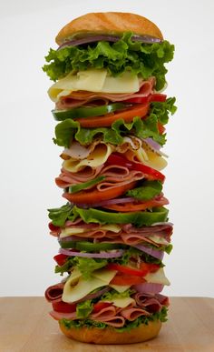 a large sandwich stacked on top of each other