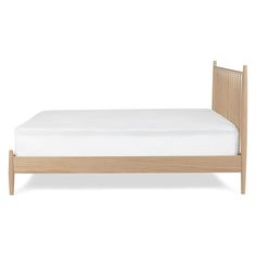 the bed frame is made from wood and has no sheets on it, but there is also a white sheet