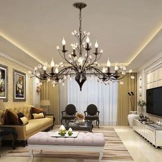 a living room filled with furniture and a large chandelier hanging from the ceiling