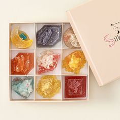 a box filled with lots of different types of candies