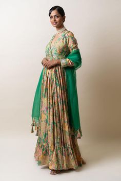 Green dola silk anarkali with paisley print and sequins hand embroidery. Comes with an organza dupatta.
Components: 2
Pattern: Printed, Hand embroidered
Type Of Work: Paisley, Sequins
Neckline: V Neck
Sleeve Type: Full
Fabric: Anarkali : Dola silk, Dupatta : Organza
Color: Green
Other Details: 
Attached lining
Length : Anarkali - 60 inches
Occasion: Sangeet - Aza Fashions Anarkali With Dupatta, Green Anarkali, Silk Anarkali, Green Paisley, Organza Dupatta, Silk Dupatta, Kurta Designs, Anarkali, Aza Fashion