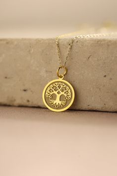 Gold Tree of Life Pendant - Tree of Life Gold Necklace ● Material of pendant: Solid Gold 14k ( REAL GOLD ) ● Metal Stamp: 14k ( REAL GOLD ) ● The pendant is available in 5 sizes: - 12,7 mm / 0.5 inches (Diameter) - 14,0 mm / 0,55 inches ( Diameter ) In the photos - 15,3 mm / 0.6 inches ( Diameter ) - 16,5 mm / 0,65 inches ( Diameter ) - 19,1 mm / 0,75 inches ( Diameter ) ( In the photos the size is 14mm / 0.55 inches Diameter ) ( Jump Ring inner diameter: 4 mm ) ● Material of chain: Solid gold 1 Tree Of Life Round Pendant Jewelry For Anniversary, Symbolic Gold Jewelry With Tree Of Life, Tree Of Life Necklace For Gift, Tree Of Life Pendant Necklace As Gift, Tree Of Life Jewelry Gift, Gold Nickel-free Necklace For Memorial, Spiritual Pendant Necklace For Anniversary Gift, Spiritual Tree Of Life Necklace Gift, Spiritual Tree Of Life Necklace For Gift