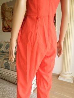 "orange Jumpsuit S Christmas Gift womens Coveralls One Piece orange Coveralls vintage womens Jumpsuit womens Overalls summer Clothing beach Made in SriLanka height of the woman in the photo - 180 cm Please refer to photos for details of condition. Condition: very good vintage Measurements : Length: 120 cm/47.2\" Bust: 88 cm/34.7\" Waist 72 cm/ 28.3\" Hips: 100 cm/39.4\" Inseam 66 cm/26\" Tag Size EUR 38 US 6 UK 10 note The color on the pictures may vary due to monitor settings and light reflecti Retro Sleeveless Jumpsuits And Rompers For Summer, Summer Orange Sleeveless Jumpsuits And Rompers, Sleeveless Orange Jumpsuits For Summer, Summer Orange Overall Jumpsuits And Rompers, Casual Orange Jumpsuits And Rompers For Party, Orange Summer Jumpsuits And Rompers, Orange Summer Overalls Jumpsuit, Orange Summer Jumpsuit Overall, Retro Fitted Summer Overalls