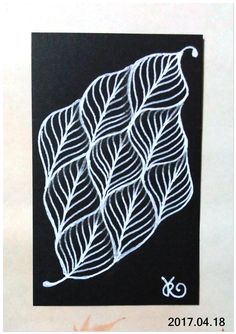 a black and white drawing with leaves on it