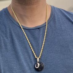 Men's iced black 8 ball hip hop chain. 14k yellow gold plated over alloy metal. 1 inch Eight Ball iced with dazzling stones. Chain measures 24" inches x 4 mm thick. Stylish & secure lobster claw clasp lock. Has a caged back for strong support. Solid weight to it at a 40 grams total. Shines so hard the stones will blind you. 100% FREE SHIPPING in USA. Order now! Eight Ball, Hip Hop Chains, Rope Chain Necklace, Gold Rope Chains, 8 Ball, Hip Hop Jewelry, Pendant Gold, Rope Chain, Lobster Claw