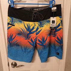 In Excellent Condition Multicolor Bottoms For Spring Surfing, Yellow Tropical Bottoms For Vacation, Yellow Tropical Style Bottoms For Vacation, Tropical Yellow Bottoms For Vacation, Yellow Bottoms For Summer Surfing, Yellow Swim Trunks For Surfing Beach Season, Yellow Summer Bottoms For Beach Season, Yellow Swim Trunks For Surfing In Summer, Yellow Short Swim Trunks For Beach Season