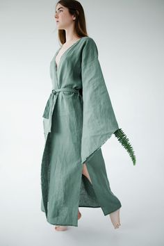 This Kimono linen dress is Fit perfectly with all women's body shapes. Easy to wear, simple and perfect for many occasions. You can wear it at home, in the forest, at a resort, or in the city, adding accessories. Boho style wrapped dress with belt Length 140cm/56in Wide long sleeves Fringed edges Side cut 50 cm/ 20 in Made of 100% natural linen, Oeko-Tex certified, free of harmful chemicals. This is a wear-resistant material and could be washed a lot of times. Sizes: XS, S, M, L, XL, XXL Custom Green Bohemian Wrap Maxi Dress, Green Linen Bohemian Dress, Bohemian Green Linen Dress, Green Bohemian Linen Dress, Spring Linen Wrap Maxi Dress, Green Linen Dress For Beach, Bohemian Ramie Maxi Dress For Spring, Eco Friendly Clothes, Linen Summer Dress