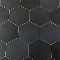 black and white hexagonal tiles with grey grout