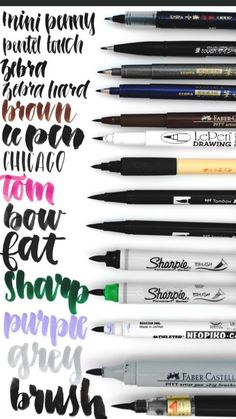 some pens are lined up on top of each other and have different ink colors in them