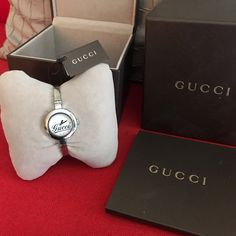 Silver Gucci Adjustable Hinge Watch! Brand New; Comes With Original Box, Tags, And Warranty Booklet. Perfect Gift For Yourself Or Someone You Love *Made For A Smaller Wrist *Style Number: Ya105528 (If You Would Like To Look Up Exact Measurements Of This Particular Watch!) Offers Always Welcome! Luxury Gucci Jewelry With Metal Dial, Gucci Jewelry With Bracelet Strap For Gift, Timeless Gucci Watch As Gift, Timeless Gucci Watch As A Gift, Gucci Silver Round Watch, Modern Gucci Bracelet For Gift, Modern Gucci Bracelet As A Gift, Designer Silver Watches As Gift, Designer Silver Watches For Gifts