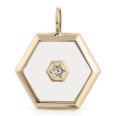 Ashley Pendant is brass plated 10K Gold. Center of pendant is filled with white enamel and center stone is a Swarovski crystal Ashley charm is a polygon shaped pendant Charm measures 1.25" long x 1.58" wide Made in the USA Matcha Tea Powder, Ashley White, Hypoallergenic Jewelry, Vermeil Jewelry, Solid Gold Jewelry, Hexagon Shape, Bracelet Collection, White Enamel, Jewelry Pouch