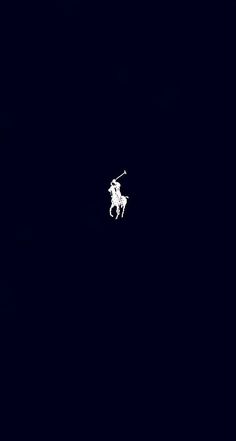 a person riding a horse in the dark with no one on it's back