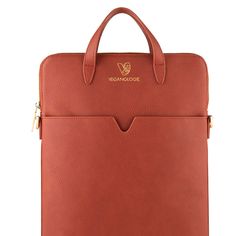 a red leather briefcase with gold handles