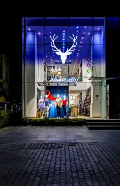 an antelope shop front lit up at night