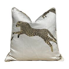 a white pillow with a cheetah on it