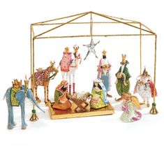 a nativity scene with figurines and decorations