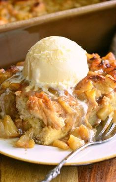 a slice of apple cobbler with ice cream on top is served on a plate