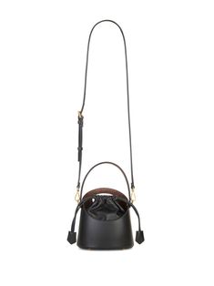 Saturno leather bucket bag from ETRO featuring black, lambskin, cotton lining, cut-out detailing, tonal stitching, bucket body, embossed logo to the front, single flat top handle, adjustable detachable shoulder strap, top drawstring fastening, main compartment, internal logo patch and internal slip pocket. Size Info UNI Color Detail Black Made In Italy Material Calf Skin 100% Season One Fall-Winter Season Two Fall-Winter Product bags.. Brand Etro Size And Fit Width 7,09 in / 18 cm Height 7,28 in Designer Bucket Hobo Bag With Removable Pouch, Designer Hobo Bucket Bag With Removable Pouch, Designer Bucket Hobo Bag With Detachable Handle, Black Calf Leather Bucket Bag With Adjustable Strap, Designer Bucket Bag With Leather Handles, Black Calf Leather Top Handle Bucket Bag, Designer Bucket Hobo Bag With Leather Handles, Black Leather Top Handle Bucket Bag, Calf Leather Bucket Bag With Handle Drop For Travel