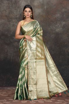 Buy beautiful mehendi green and silver tissue Kanjeevaram saree online in USA. Be the center of attraction on special occasions in ethnic sarees, designer sarees, embroidered sarees, handwoven sarees, pure silk sarees from Pure Elegance Indian saree store in USA.-full view Green Tussar Silk Pre-draped Saree, Green Tissue Silk Pre-draped Saree For Festive Occasions, Festive Green Tissue Silk Pre-draped Saree, Navratri Green Tissue Silk Blouse Piece, Green Tissue Silk Blouse Piece For Navratri, Green Pre-draped Saree With Cutdana In Tissue Silk, Green Tissue Silk Saree With Zari Work, Diwali Green Tissue Silk Pre-draped Saree, Green Tissue Silk Pre-draped Saree For Diwali