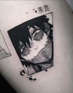 a black and white photo of an anime character on the back of a man's shoulder