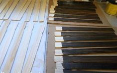 several pieces of wood are laid out on the floor