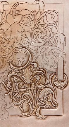 an intricately carved design on the side of a wall