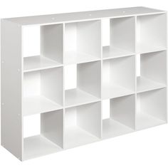 a white bookcase with eight compartments on each side