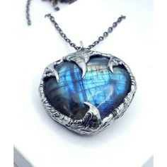 I Took An Amazing Blue Fire Labradorite Heart Shaped Crystal And Crafted Into A Beautiful Renaissance / Medieval Pendant, Hung From An 18" Long Matching Chain. This Isn't Your Typical Jewelry Piece, And It Will Definitely Be One Of A Kind. The Metal Work Is Hand Done By Me Using A Tin & Sterling Silver Bearing Low Melting Solder Alloy In Tiffany Style Metalwork That Has Been Hand Patinated And Polished Then Sealed. This Comes A 18in Gunmetal Chain Will Be Attached, As Pictured. Heart Is A Bit Heavier, Ask If You Perfer A Longer Chain For This Reason, Takes Stress Off The Neck. Can Request Any Length Up To 30". Thanks For Looking! Handmade Jewelry, Healing, Reiki, Wicken, Wicca, Healing Cr Silver Gemstone Heart Pendant Necklace, Unique Gemstone Heart Pendant Necklace, Handmade Blue Heart Cut Jewelry, Unique Handmade Heart Cut Jewelry, Unique Heart-shaped Necklaces With Natural Stones, Handmade Silver Jewelry With Heart Cut, Unique Silver Heart Charm Necklace, Handmade Silver Necklace With Heart Cut, Handmade Silver Heart Cut Necklace