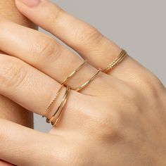 our Tiny Dancer Ring is as much of a classic as the beloved song it is named after. an ideal choice for minimalists or active lifestyles, you can't go wrong with this effortless band. ideal for stacking and a staple in curating your capsule jewelry collection. fine 14k solid gold .49 grams .9mm thick Capsule Jewelry, Brazilian Gold, Synthetic Diamond, Gold Bond, Tiny Dancer, Cultured Pearls, Gold Vermeil, Rhodium Plated, Precious Stones