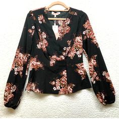 Leyden Shirt Womens Small Black Pink Blouse Floral Wrap Snap Peplum Long Sleeve New With Tags Brand: Leyden Size: Small Style: Wrap Blouse Colors: Black, Pink Material: Polyester Neckline: V Neck Sleeve: Long Sold As Pictured. Thanks For Looking! Feminine Black Top For Brunch, Feminine Floral Print Tops For Night Out, Feminine Black Tops For Fall, Feminine Floral Print Blouse For Night Out, Black Long Sleeve Blouse For Brunch, Long Sleeve Blouse For Date Night In Spring, Black Spring Blouse For Brunch, Long Sleeve Black Blouse For Brunch, Floral Print Blouse For Night Out In Fall