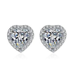 "𝐌𝐚𝐢𝐧 𝐒𝐭𝐨𝐧𝐞 𝐃𝐞𝐭𝐚𝐢𝐥𝐬 ➟Stone Type = Moissanite  ➟Diamond Shape = Heart Cut ➟Diamond Color = FG ➟Diamond Clarity = VVS1 ➟Diamond Creation = Lab-Created ➟Total Carat Weight Approx. = 1.00ct ✥ 𝐒𝐢𝐝𝐞 𝐒𝐭𝐨𝐧𝐞 𝐃𝐞𝐭𝐚𝐢𝐥𝐬  ➟Stone Type = Simulated Diamond ➟Diamond Shape = Round Cut ➟Diamond Color = D ➟Diamond Clarity = VVS1 ➟Total Carat Weight Approx. = 0.25ct *WE OFFER CUSTOMIZATION* If you want to add personal touch to this piece contact us and we will create one just for you. Sterling Silver Heart Cut Earrings For Wedding, Elegant Round Heart Earrings In Cubic Zirconia, Elegant Round Cubic Zirconia Heart Earrings, Heart Cut Cubic Zirconia Earrings With Prong Setting, Elegant Cubic Zirconia Heart Earrings For Formal Occasions, Formal Elegant Cubic Zirconia Heart Earrings, Classic Diamond White Earrings For Valentine's Day, Diamond White Round Cut Earrings For Valentine's Day, Elegant Sterling Silver Heart Earrings With Diamond Cut