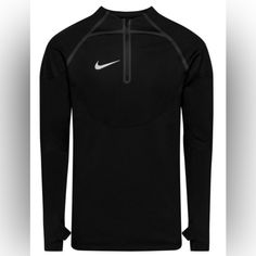 the nike dry - fit top is shown in black and white, with a zippered neck