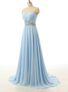 a light blue strapless dress on a mannequin