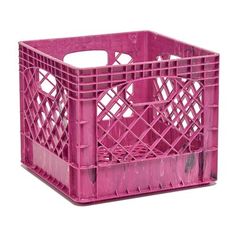 a pink plastic crate sitting on top of a white floor